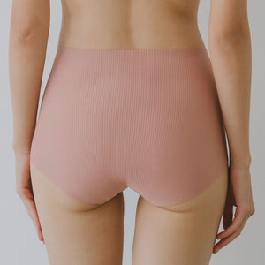 Forme Seamless Super Mid-Rise Rise Cheekie in Rosy Peach